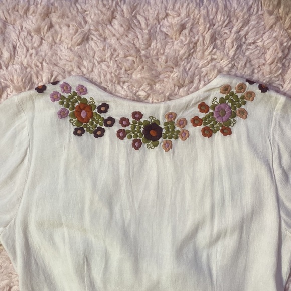 Tularosa Rowley Romper in cream with embroidery flowers - Picture 10 of 12